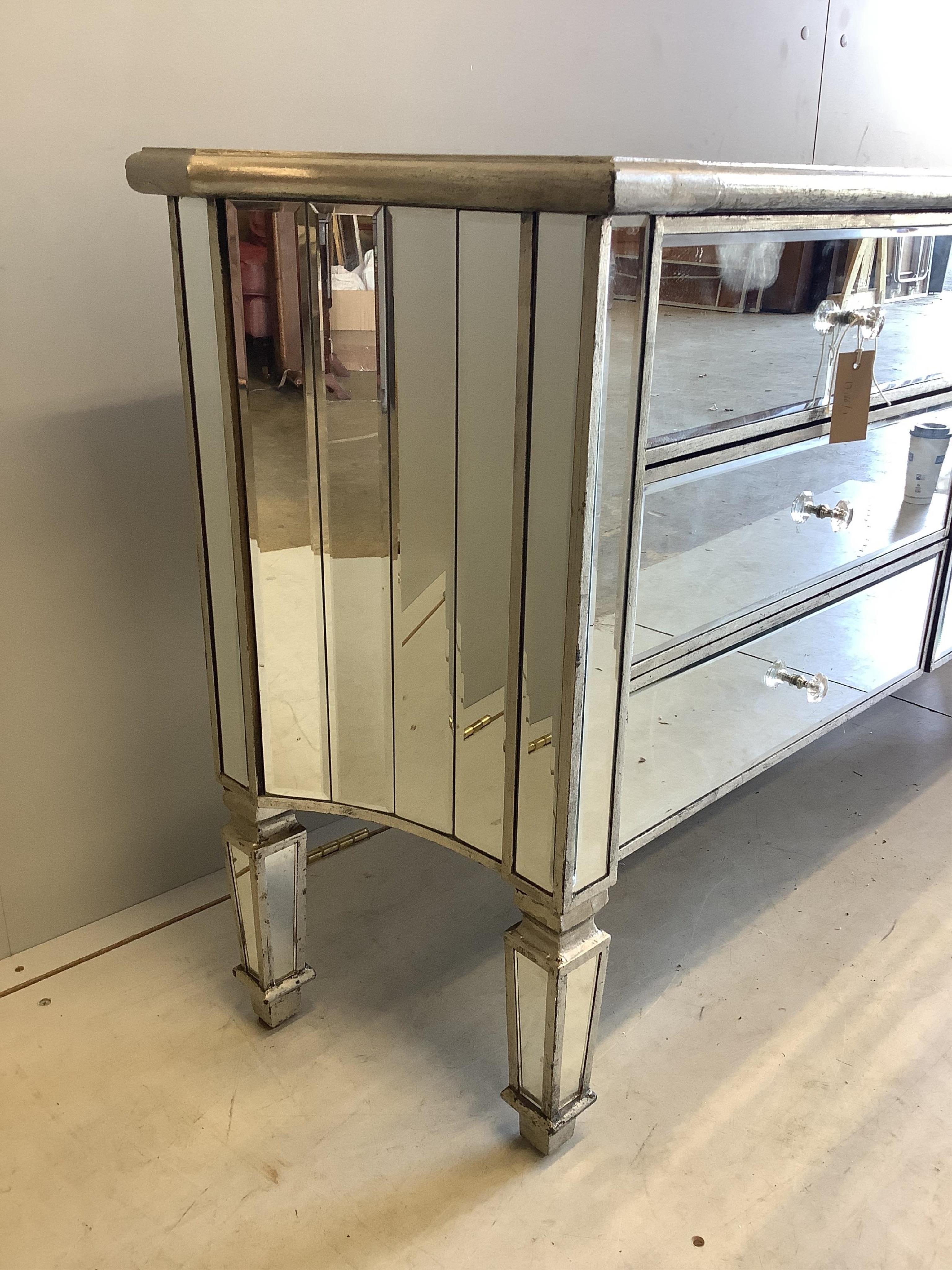 A Contemporary mirrored chest of drawers, width 138cm, depth 34cm, height 73cm. Condition - good